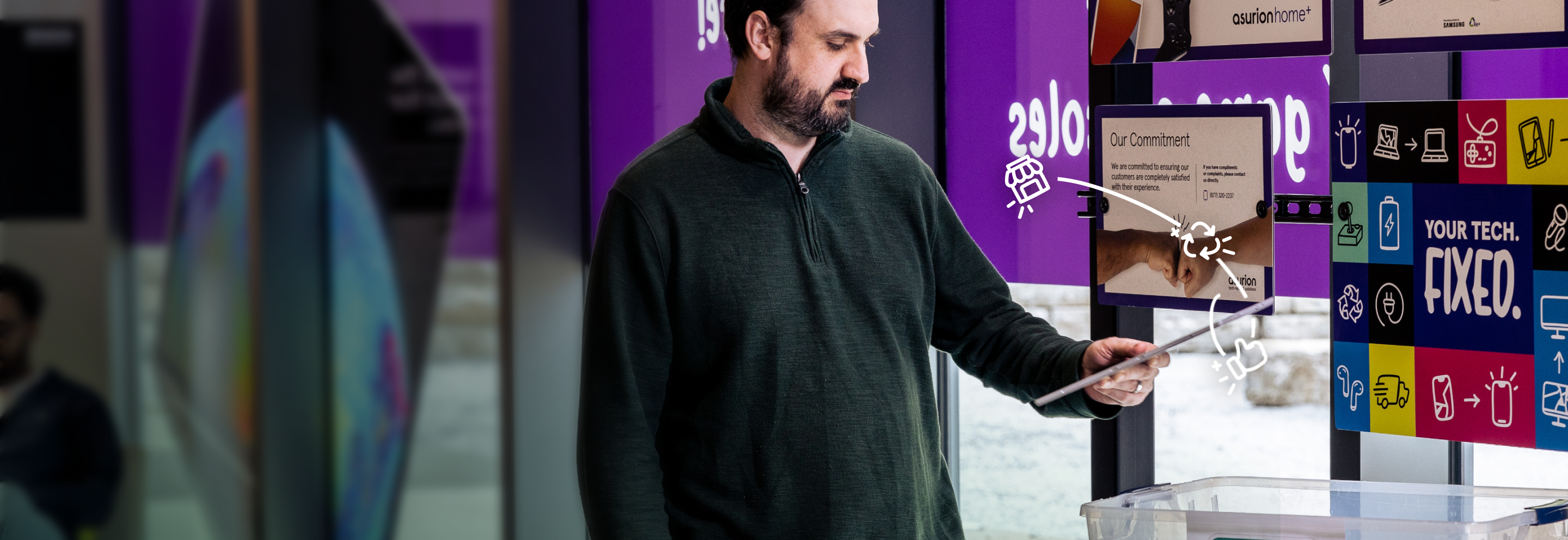 man recycling device at Asurion Tech Repair & Solutions